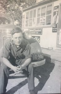 My Grandfather (my moms dad) in front of his car in Saskatchewan. License plate reads '42. He had a passion for fixing cars too.